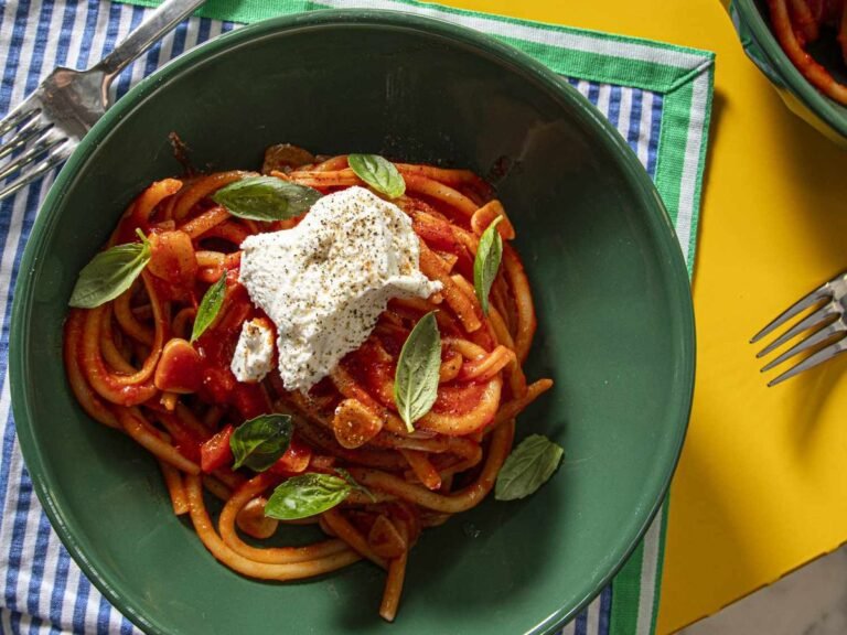 This quick, easy pasta combines sweet garlic, silky passata, and gochujang for a savory, fiery sauce, finished with creamy ricotta and basil.