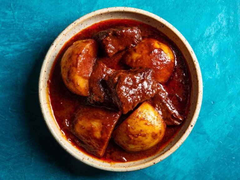 A rich, heavily spiced Thai curry with braised beef short ribs and potatoes.